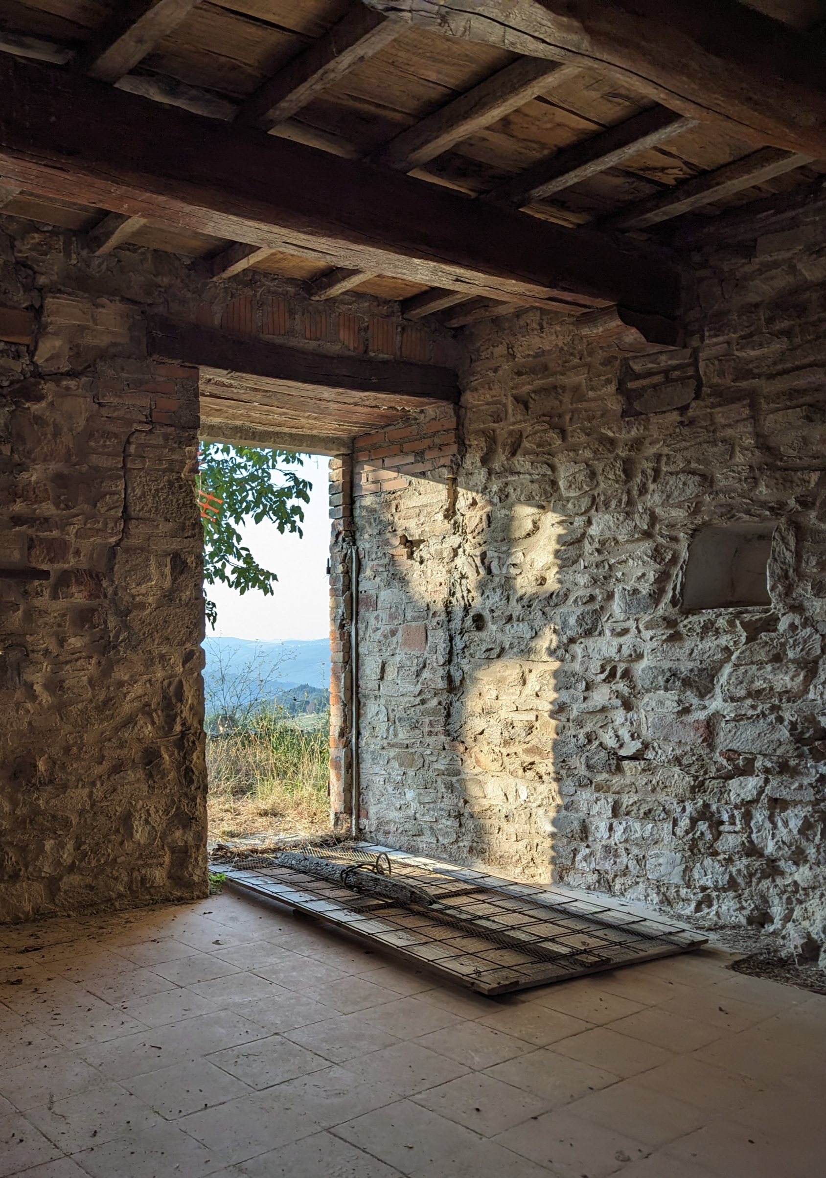 View looking through an open door into the medieval complex